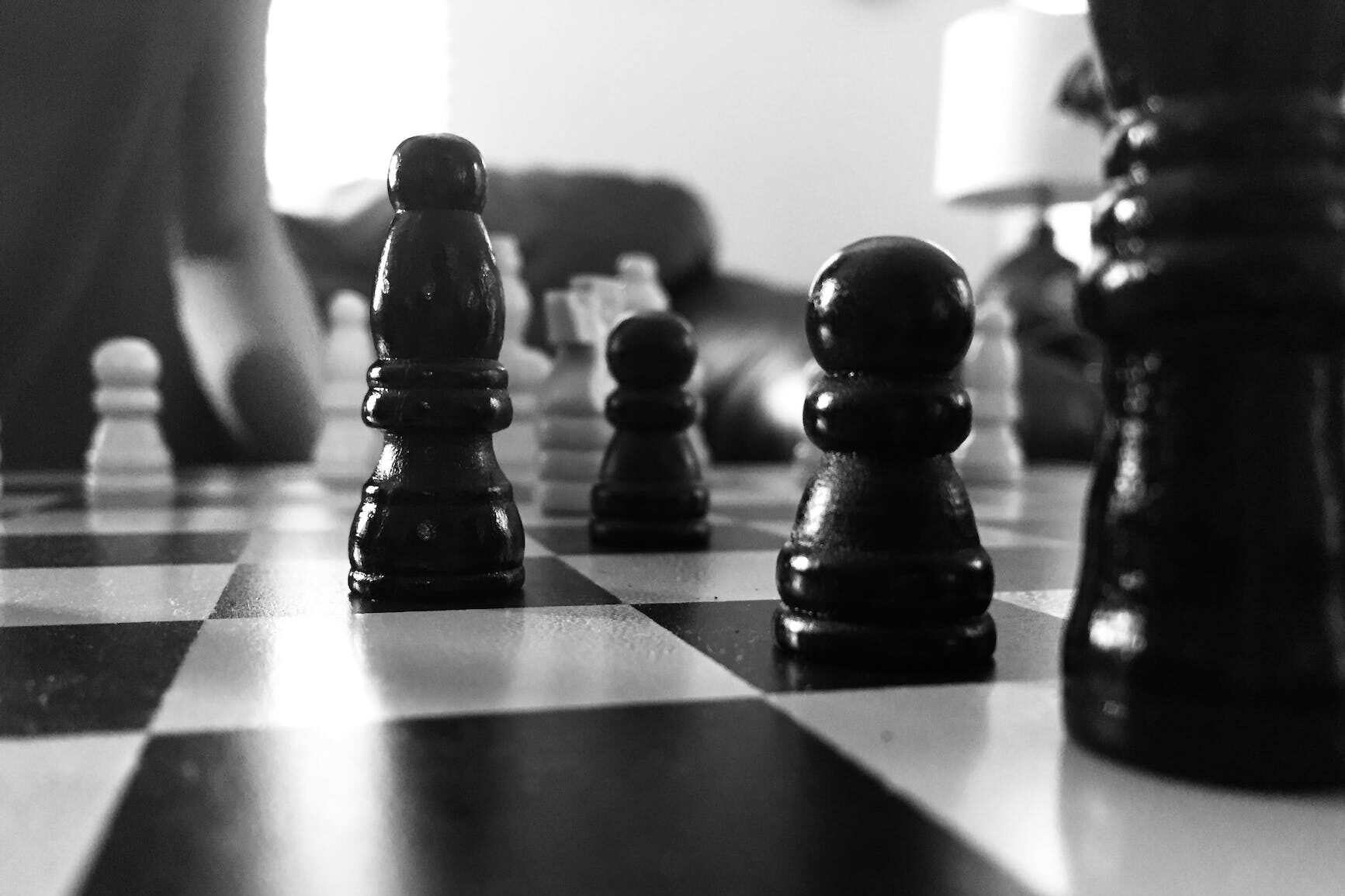 grayscale photography of chess board